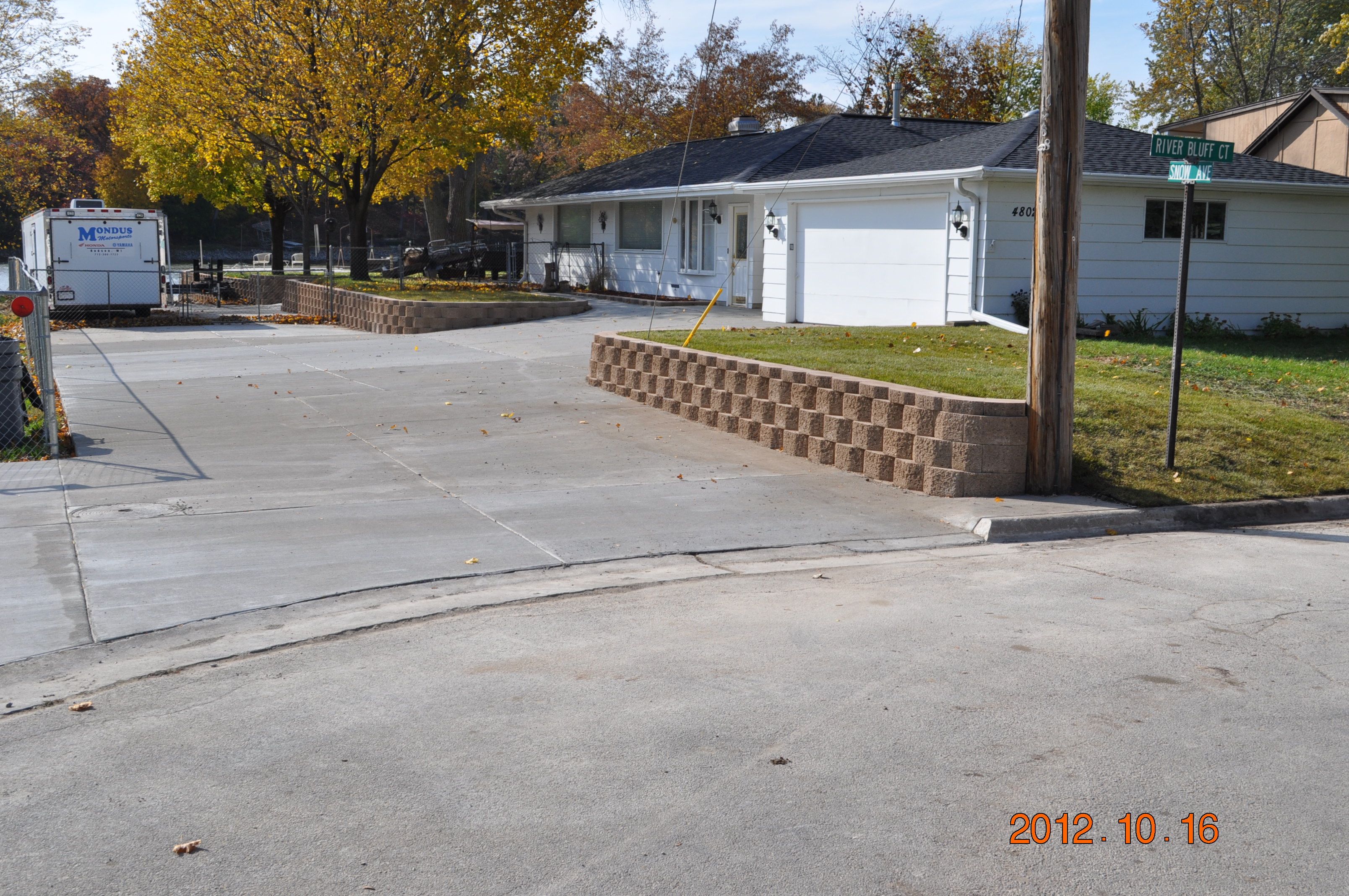 Smaller retaining walls like this one help to support slopes and level off yards.