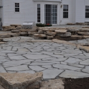 This Rockford patio was made with natural stone pavers.